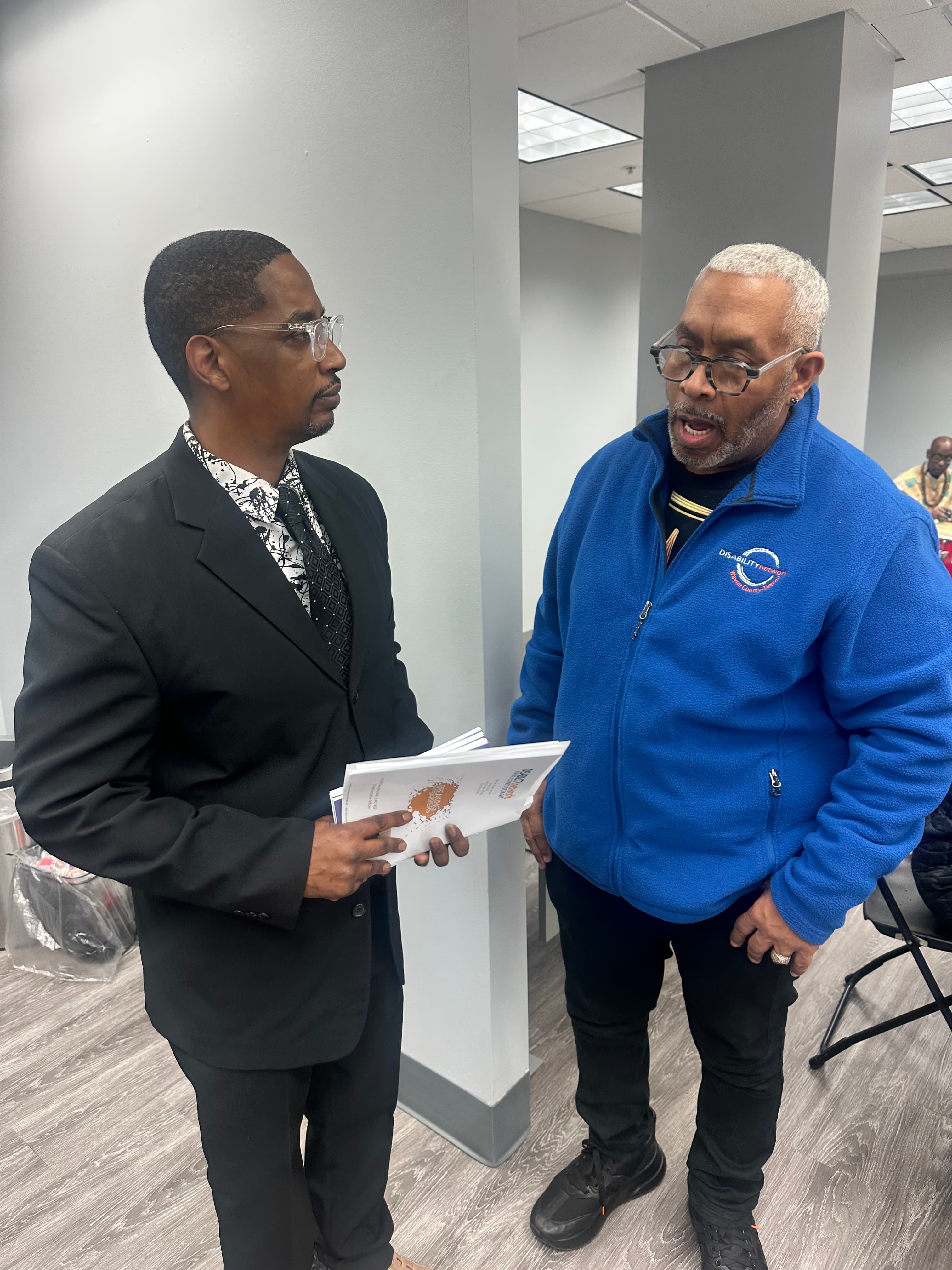 Mark with a mentor discussing advocacy