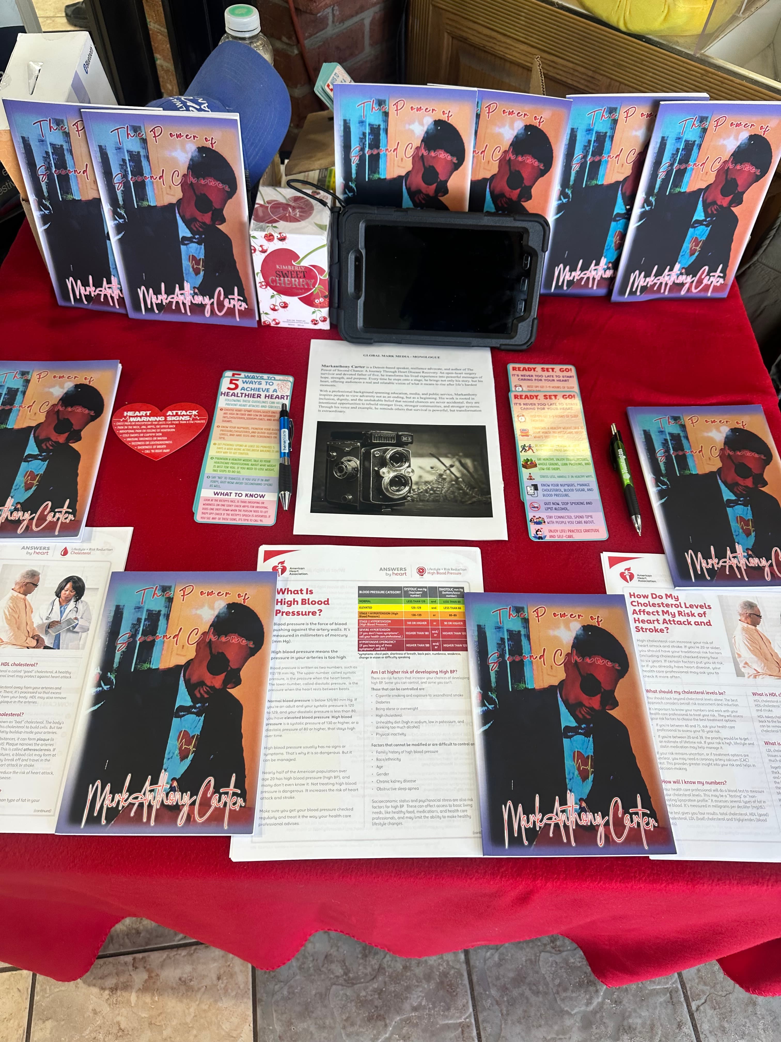 Book display at community event with health resources