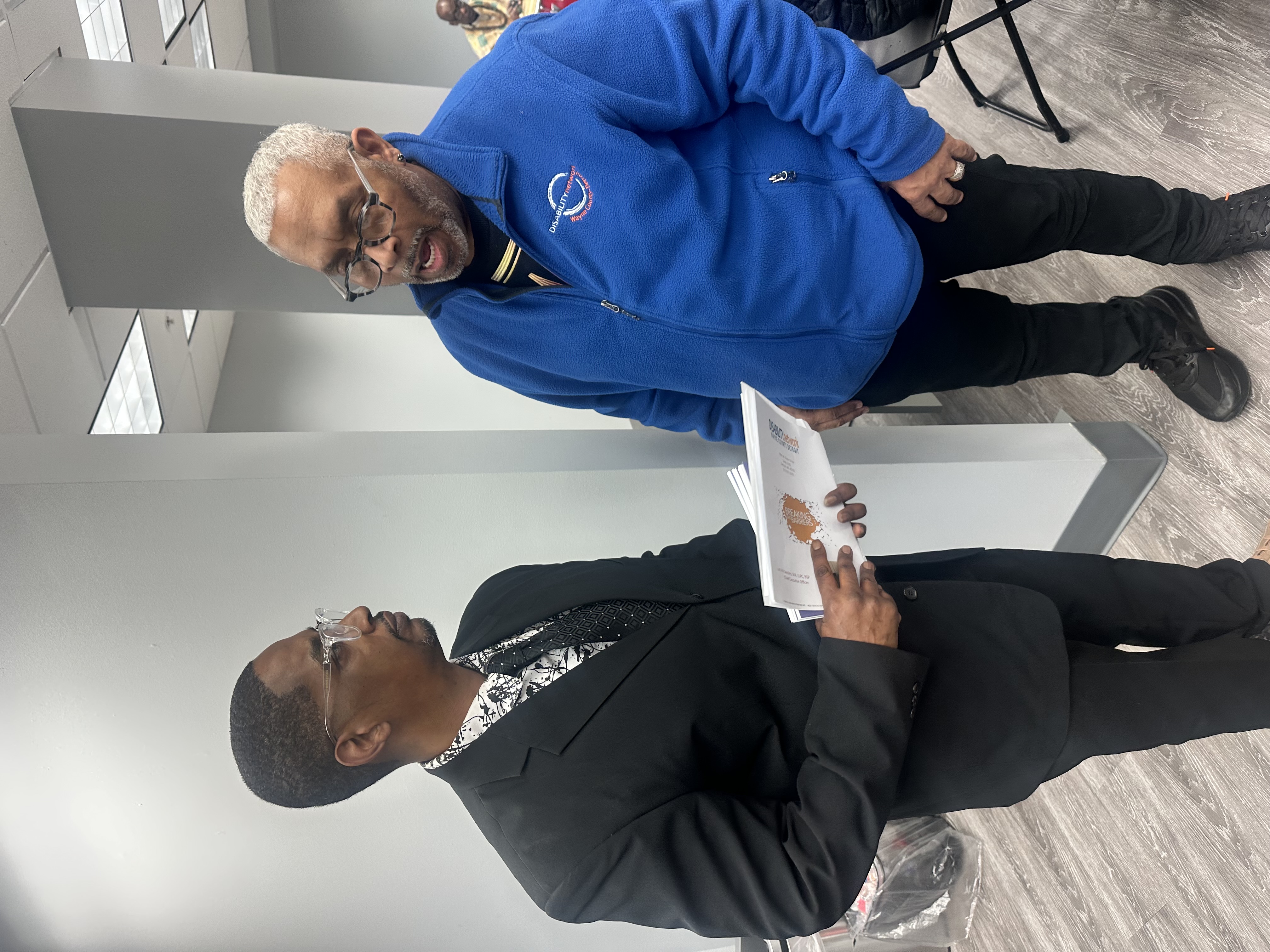 Mark with a mentor discussing advocacy