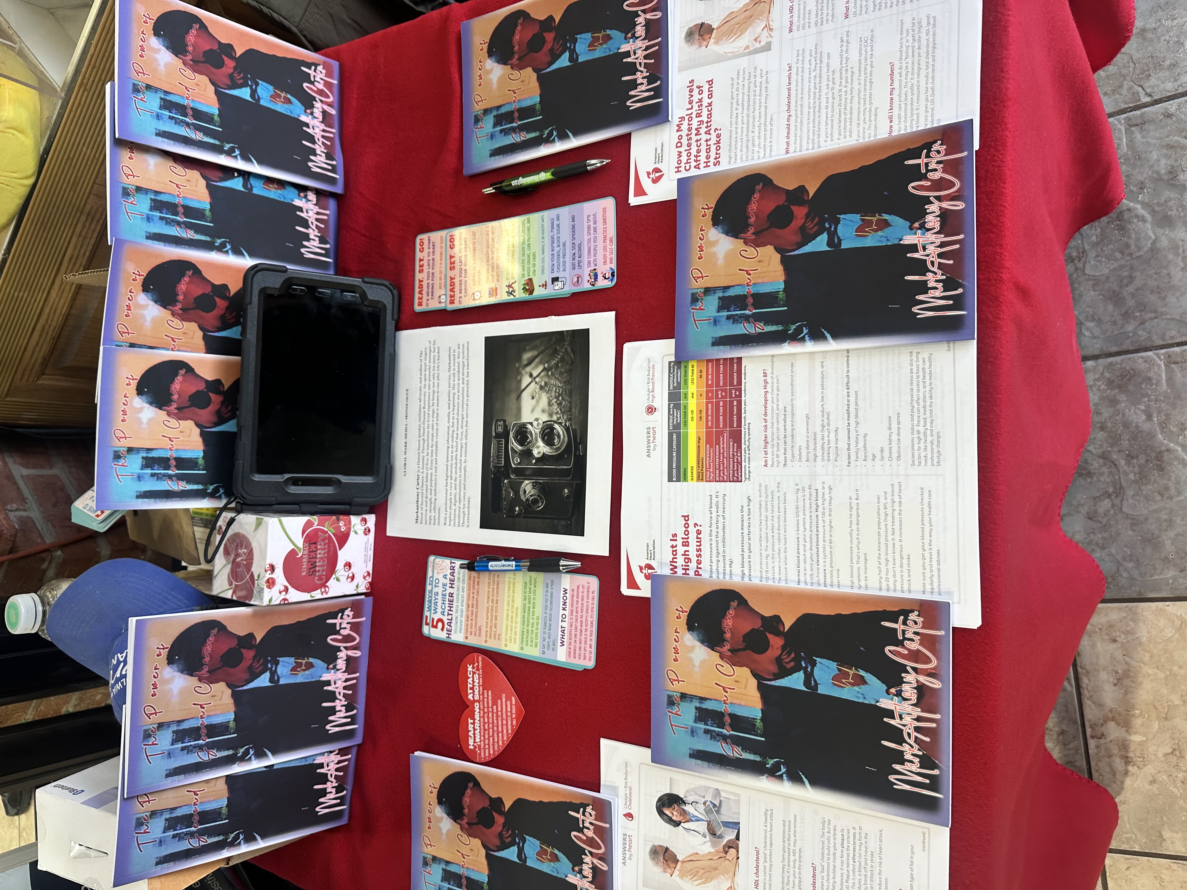 Book display at community event with health resources